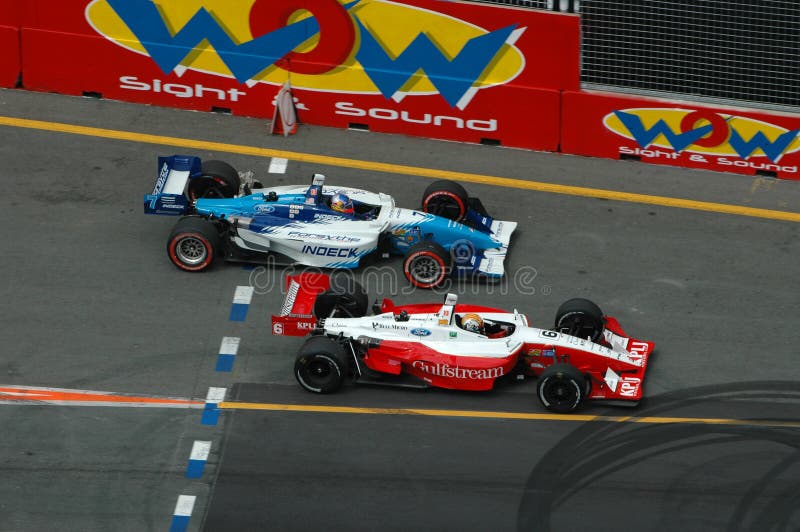 Image taken of two indy cars during the Lexmark indy which is held on the gold coast in australia. Image taken of two indy cars during the Lexmark indy which is held on the gold coast in australia