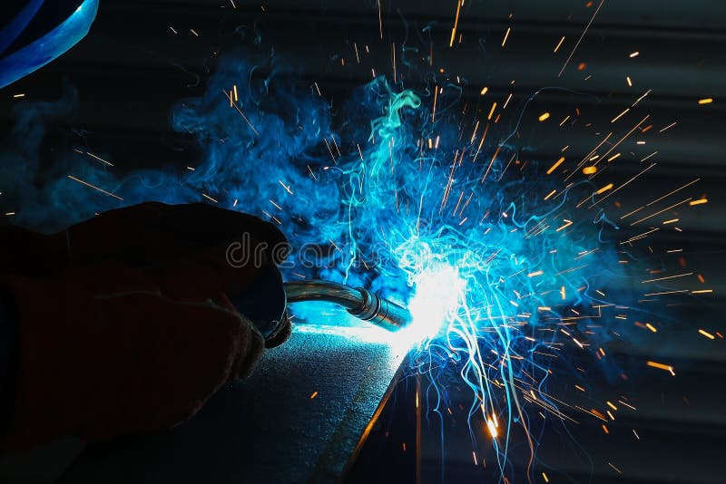 Inert gas welding stock image. Image of mask, garage 124557485