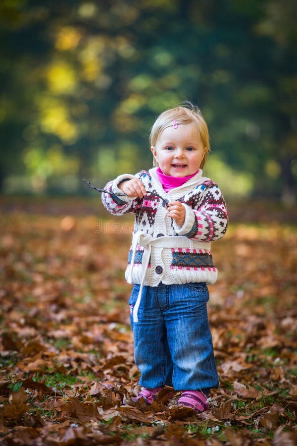 Infant baby girl in park