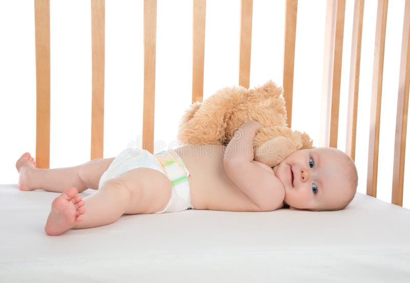 Infant child baby girl toddler lying in bed