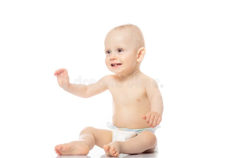 Infant child baby toddler crawling happy looking straight isolated on a white background. Infant baby posing stock image Infant child baby toddler crawling happy looking straight isolated on a white background. Infant baby posing stock image