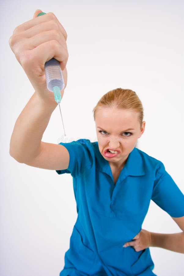 Funny picture of female hand in medical gloves with syringe. Funny picture of female hand in medical gloves with syringe