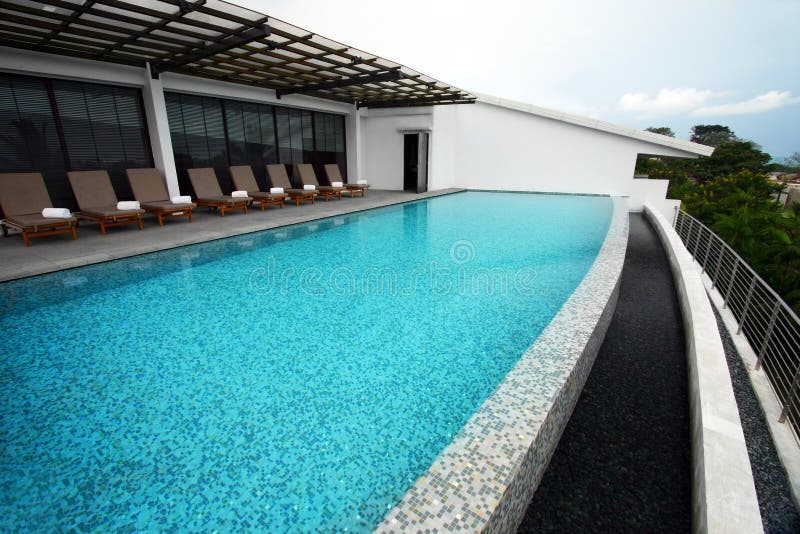 Infinity pool design, roof top of resort hotel