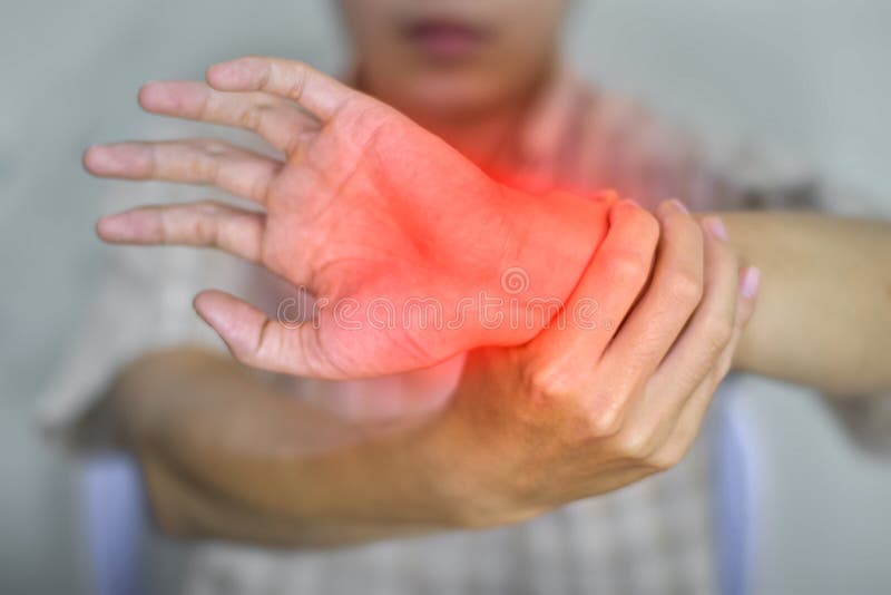 Inflammation of Asian Man Wrist Joint. Concept of Joint Pain and Hand Problems Stock Image