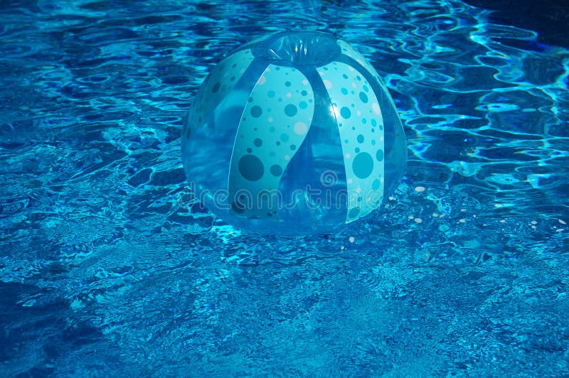 Inflated Toys In A Swimming Pool stock photo