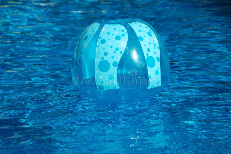 Inflated Toys In A Swimming Pool stock photography