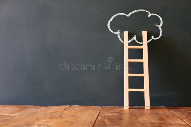 Wooden ladder and cloud infographics on blackboard background. Wooden ladder and cloud infographics on blackboard background.