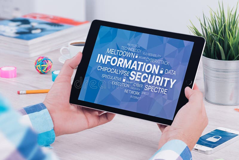 Information security concept on digital tablet pc in male hands stock photo
