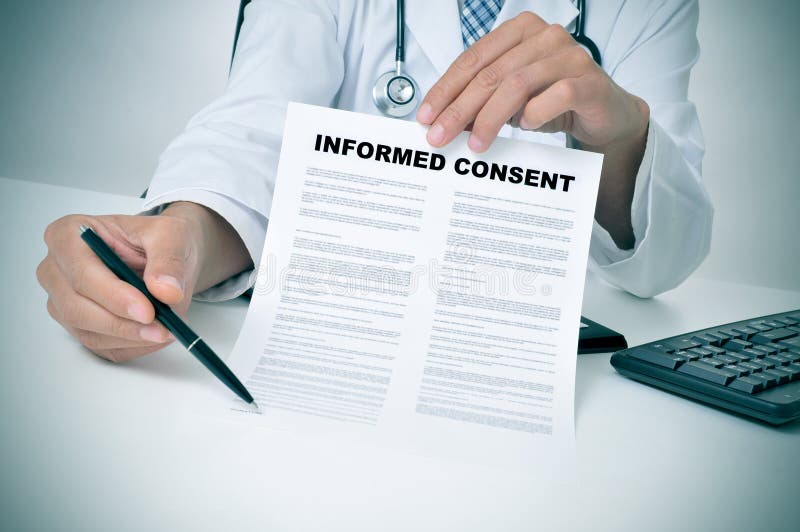 A doctor in his office showing an informed consent document and pointing with a pen where the patient must to sign