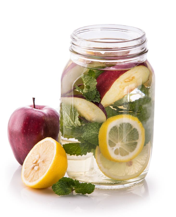 Infused Fresh Fruit Water of Lemon, Apple and Mint Leaf. Isolate Stock