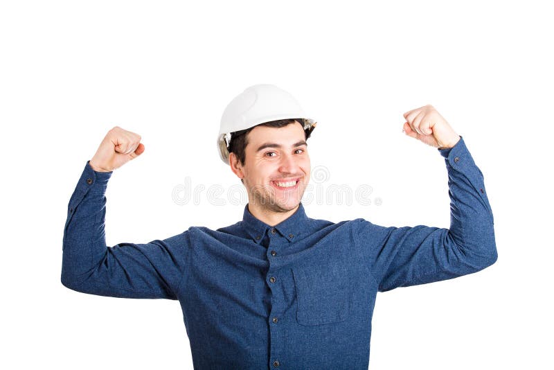 Ingegnere potente che mostra i muscoli immagini stock libere da diritti Ingegnere potente che mostra i muscoli immagini stock libere da diritti