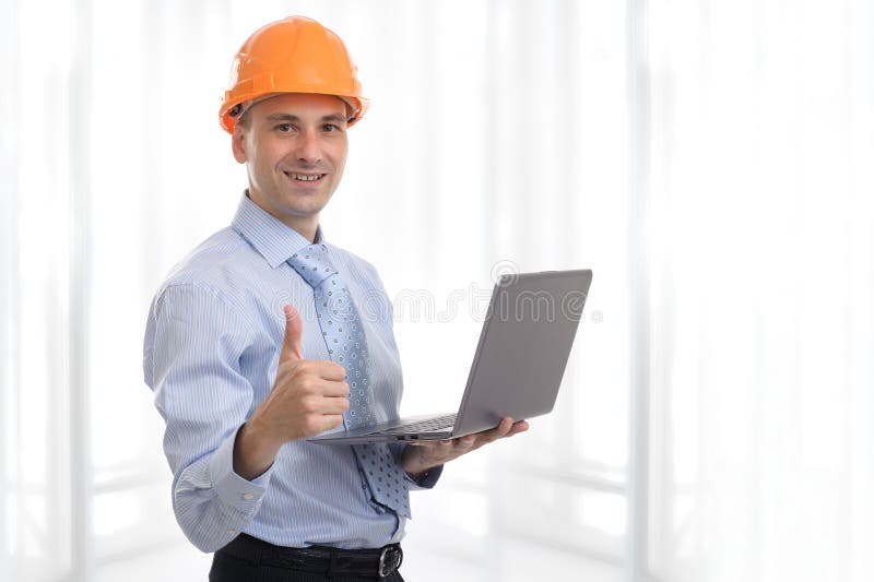 Ingenieur mit Laptop lizenzfreies stockbild Ingenieur mit Laptop lizenzfreies stockbild