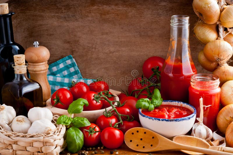 Still life with traditional homemade tomato sauce and ingredients. Still life with traditional homemade tomato sauce and ingredients