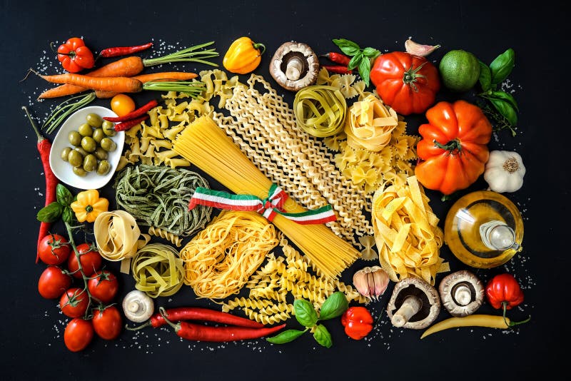 Ingredienti alimentari italiani sul fondo dell'ardesia