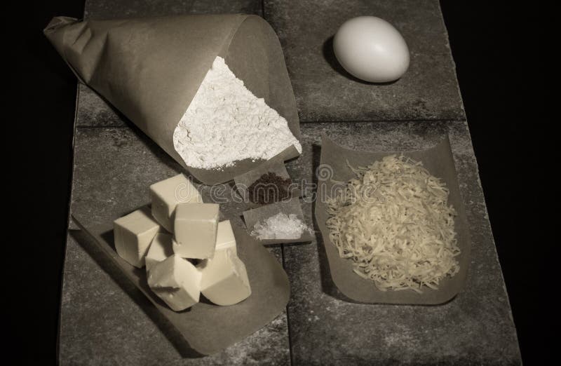 Ingredients for Baking on Pergament Paper on Grey Stone Table Stock