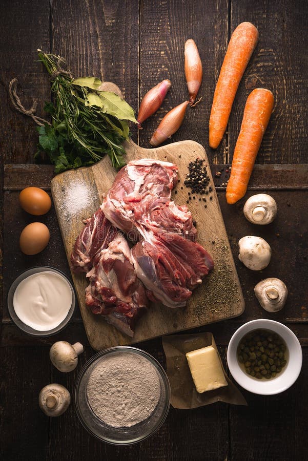 Ingredients for blanquette on the wooden table vertical royalty free stock photos Ingredients for blanquette on the wooden table vertical royalty free stock photos