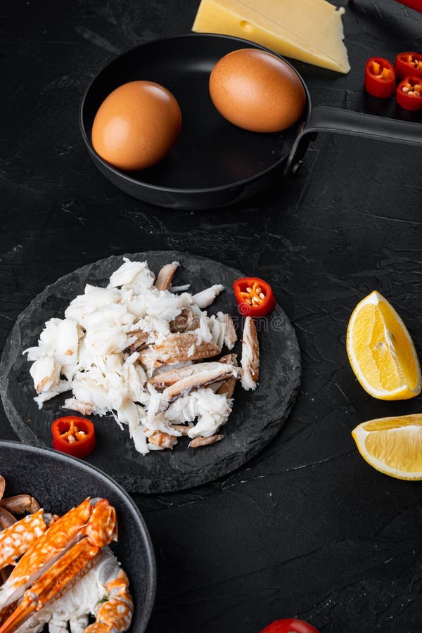 Ingredients for Breakfast Omelette with Crab Meat and Cheese, on Black