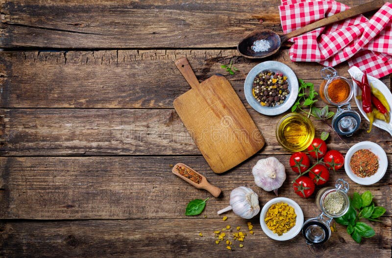 Ingredients for cooking and empty cutting board on