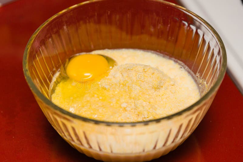 The Ingredients Cornmeal, Egg and Milk Ready for Mixing Stock Photo
