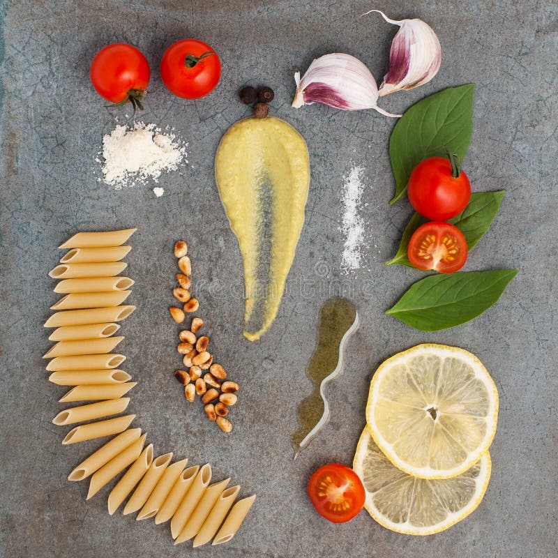 Ingredients for Pesto Sauce, Pasta and Cherry Tomatoes on a Stone