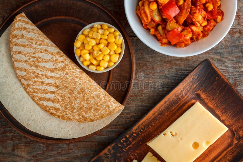 Ingredients for Quesadilla, Burito, Taco, on a Wooden Table Stock Photo
