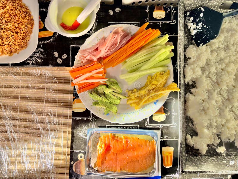Ingredients To Make Sushi with Rice, Seaweed, Salmon Stock Image
