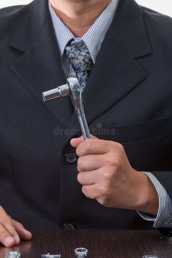 Ingénieur mécanicien en chef tenant beaucoup d'outils images libres de droits Ingénieur mécanicien en chef tenant beaucoup d'outils images libres de droits