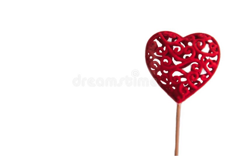 Inimă decorativă roșie pe băț de lemn izolat pe fond alb stock photo
