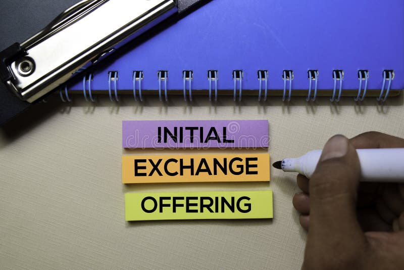 Initial Exchange Offering IEO Text on Sticky Notes Isolated on Office