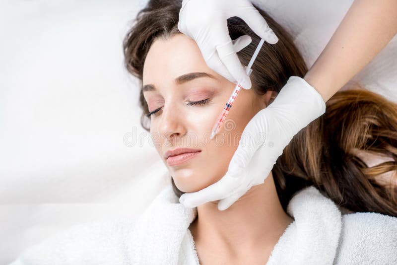 Injection cosmétique de botox photos stock Injection cosmétique de botox photos stock