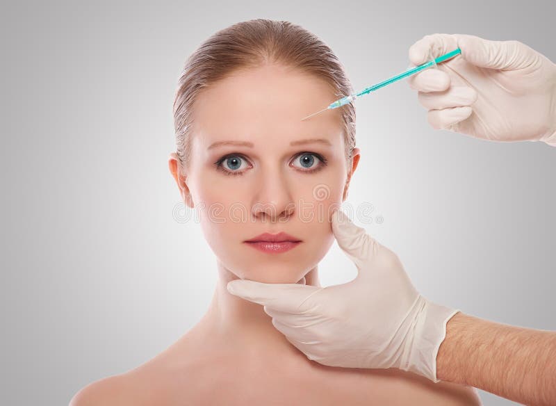 Injeção cosmética de Botox na face fêmea fotografia de stock Injeção cosmética de Botox na face fêmea fotografia de stock