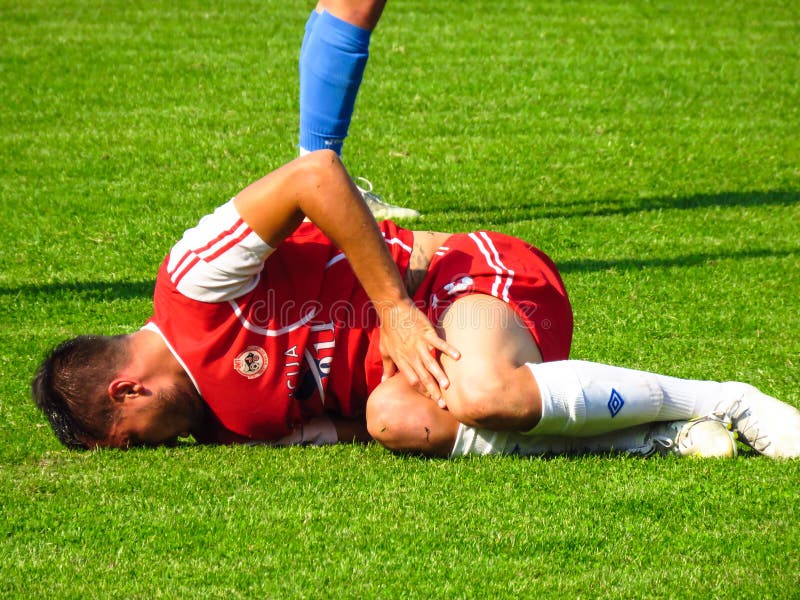 Injured Football Player on the Pitch Editorial Stock Photo  Image of