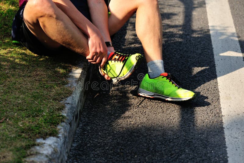 Runner with Ankle Sprain Screaming Stock Image Image of marathon