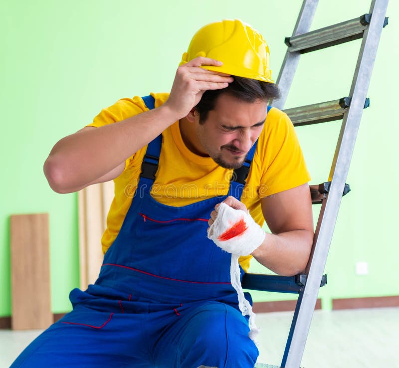 Injured Worker at the Work Site Stock Image Image of protection, care