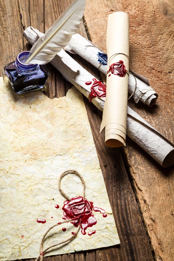 Ancient scrolls stacked on pile. Old scroll library. Stock Photo