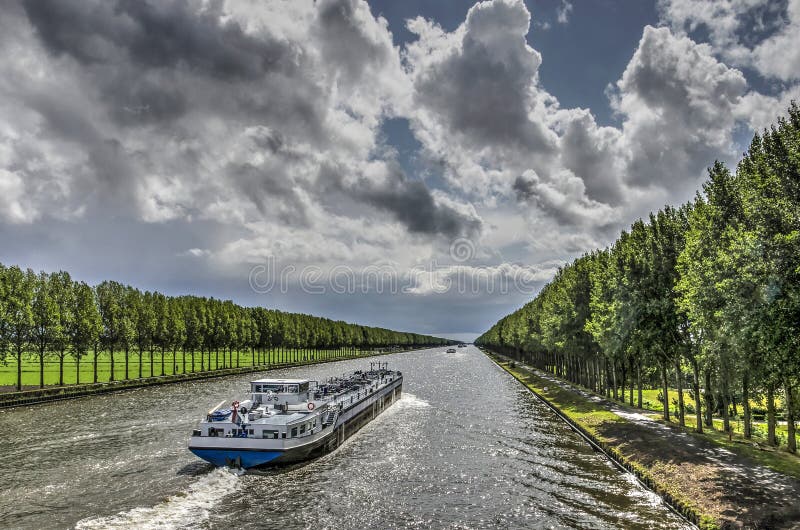 Inland barge on the Amsterdam Rhine canal royalty free stock photo Inland barge on the Amsterdam Rhine canal royalty free stock photo