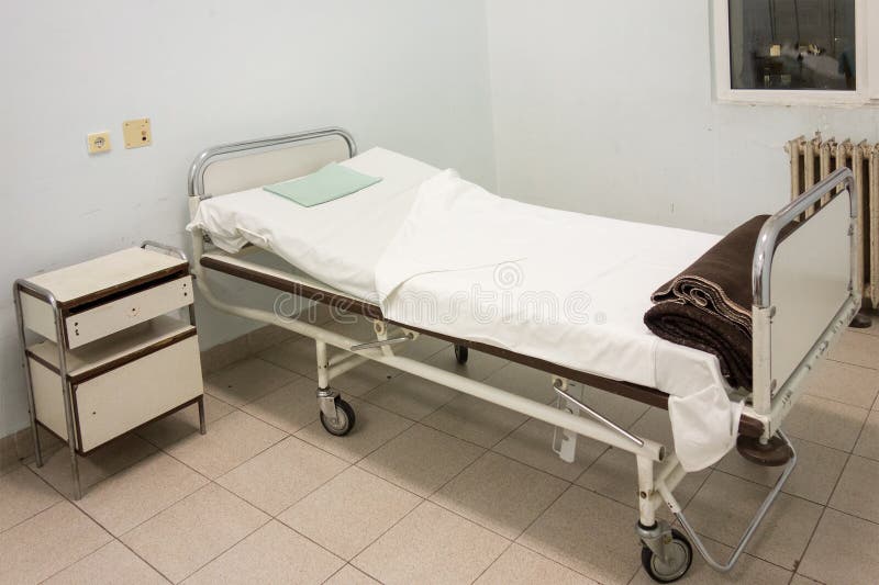 Innenraum des Krankenhauszimmers mit Bett lizenzfreie stockbilder Innenraum des Krankenhauszimmers mit Bett lizenzfreie stockbilder