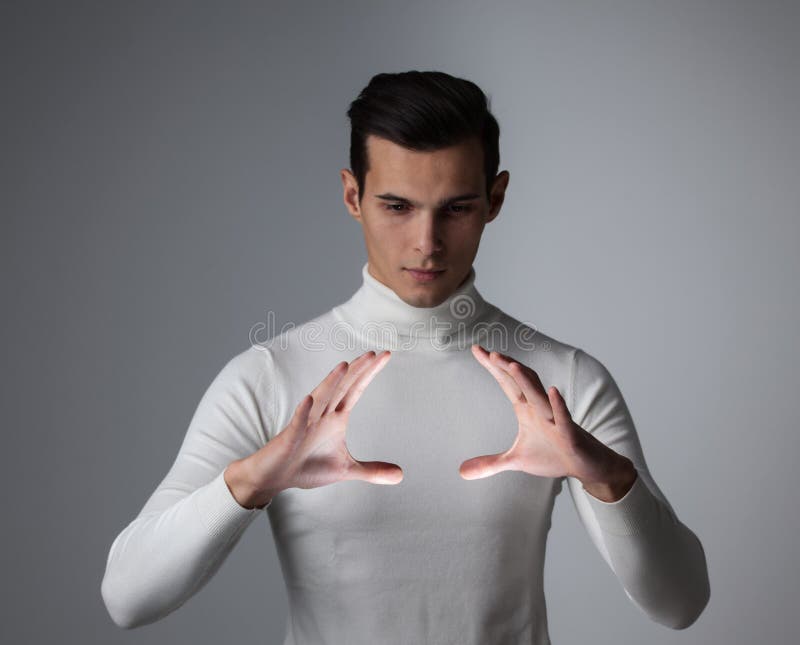 Man holding abstract glowing object royalty free stock photography