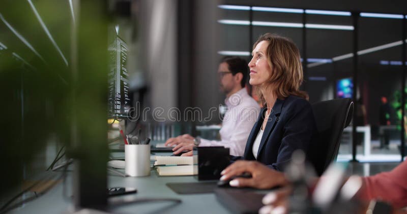 Innovative Programmers Collaborating on Diverse Software Solutions in Office Setting. Software methodology stock images, royalty-free photos and pictures