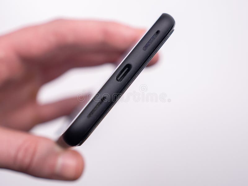 Input connector for charging a smartphone battery close-up view o stock photography