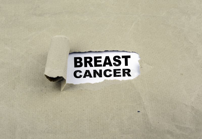 Inscription revealed on old paper - Breast Cancer royalty free stock image