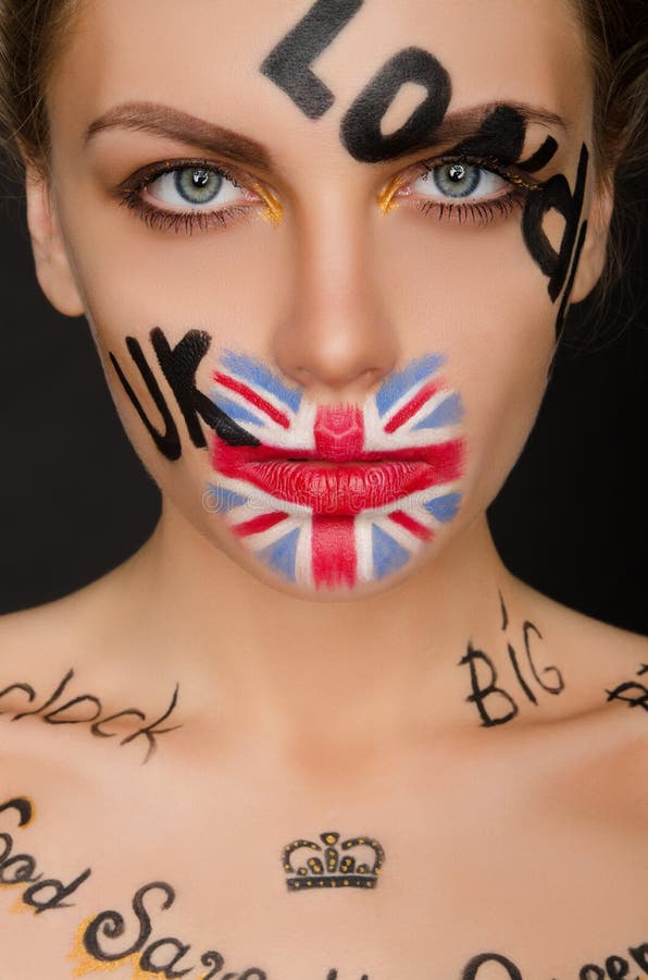Inscriptions and flag of england on woman`s face royalty free stock photo Inscriptions and flag of england on woman`s face royalty free stock photo