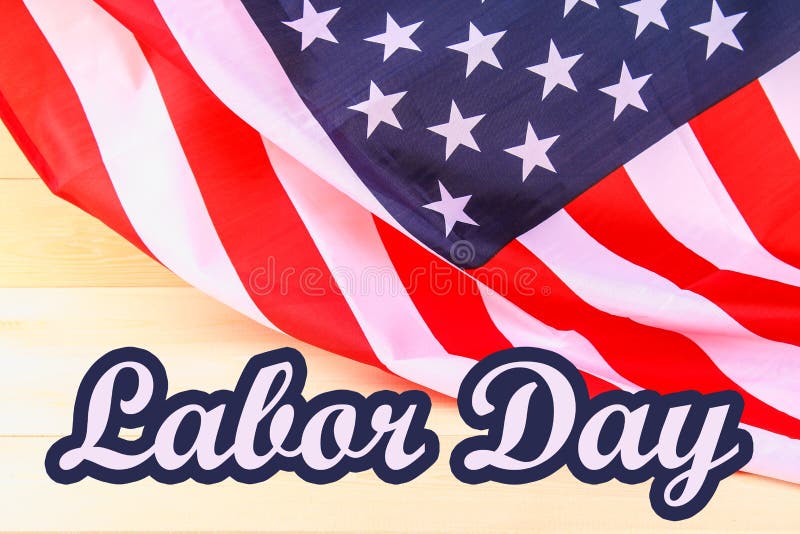 Insegna felice di festa del lavoro, fondo patriottico americano, testo sulla bandiera degli Stati Uniti d'America fotografia stock Insegna felice di festa del lavoro, fondo patriottico americano, testo sulla bandiera degli Stati Uniti d'America fotografia stock