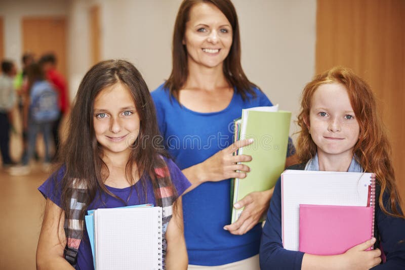 Insegnante con alunni fotografia stock