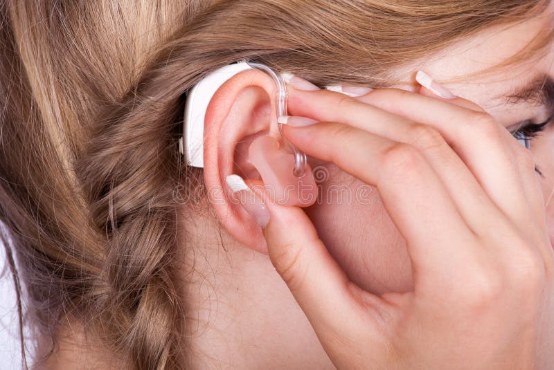 Inserting a hearing aid