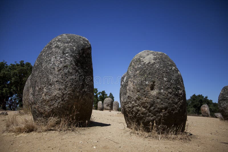 Inside almendres cromlech stone circle. The areas of Extremadura Spain and Alentejo Portugal bring together a huge amount of megalithic archaeological sites stock photo Inside almendres cromlech stone circle. The areas of Extremadura Spain and Alentejo Portugal bring together a huge amount of megalithic archaeological sites stock photo