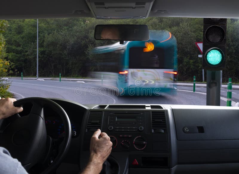 Inside car view of a green traffic light