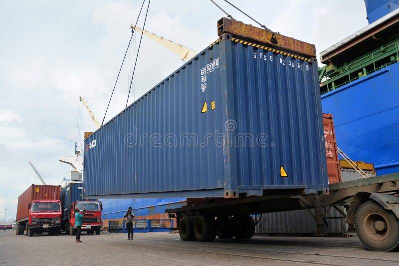 Inside of chittagong port yard and container handling from ship. loading unloading photographs. stock photos