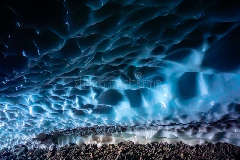 Inside a cold ice cave royalty free stock photo