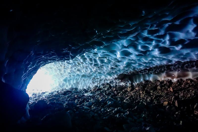 Inside a cold ice cave stock photography